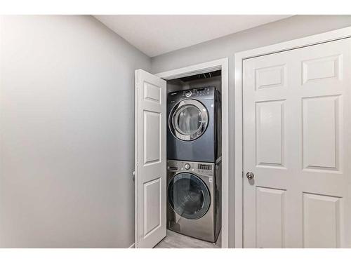 1180 Berkley Drive Nw, Calgary, AB - Indoor Photo Showing Laundry Room