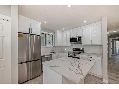 1180 Berkley Drive Nw, Calgary, AB - Indoor Photo Showing Kitchen With Stainless Steel Kitchen With Upgraded Kitchen