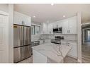 1180 Berkley Drive Nw, Calgary, AB  - Indoor Photo Showing Kitchen With Stainless Steel Kitchen With Upgraded Kitchen 