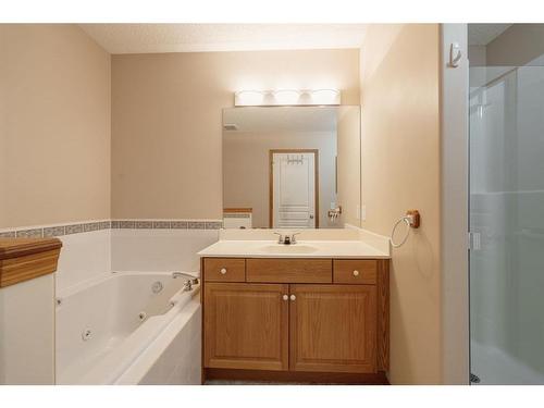 84 West Springs Gate Sw, Calgary, AB - Indoor Photo Showing Bathroom