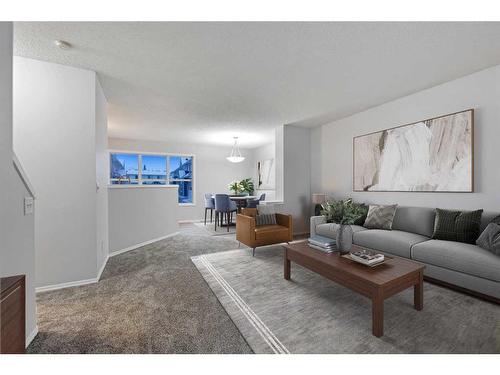 348 Mckenzie Towne Link Se, Calgary, AB - Indoor Photo Showing Living Room