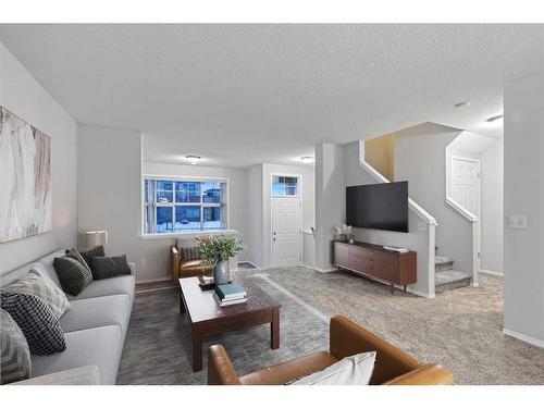 348 Mckenzie Towne Link Se, Calgary, AB - Indoor Photo Showing Living Room