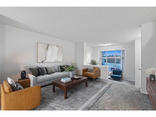 348 Mckenzie Towne Link Se, Calgary, AB - Indoor Photo Showing Living Room