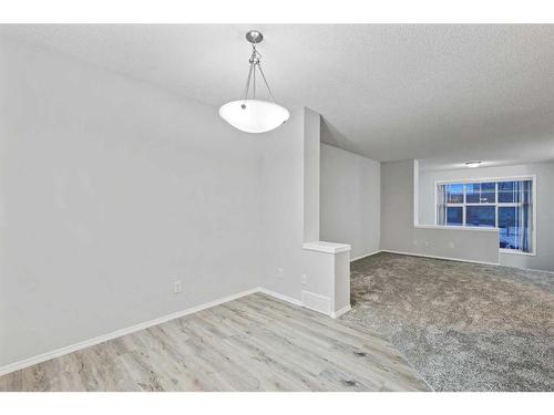 348 Mckenzie Towne Link Se, Calgary, AB - Indoor Photo Showing Other Room