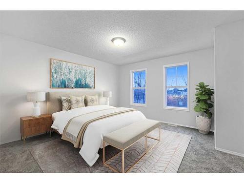 348 Mckenzie Towne Link Se, Calgary, AB - Indoor Photo Showing Bedroom