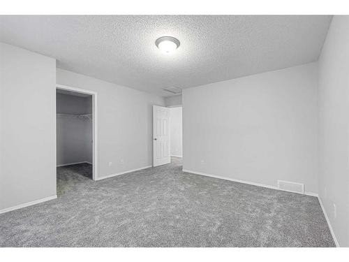 348 Mckenzie Towne Link Se, Calgary, AB - Indoor Photo Showing Other Room