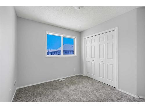 348 Mckenzie Towne Link Se, Calgary, AB - Indoor Photo Showing Other Room