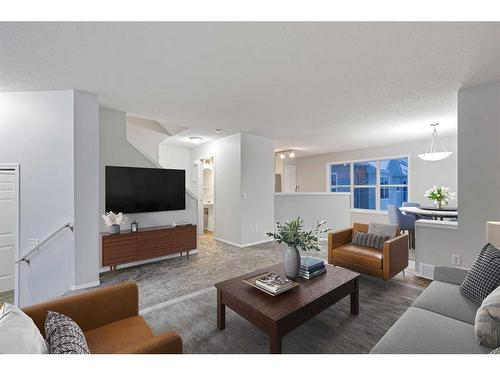 348 Mckenzie Towne Link Se, Calgary, AB - Indoor Photo Showing Living Room