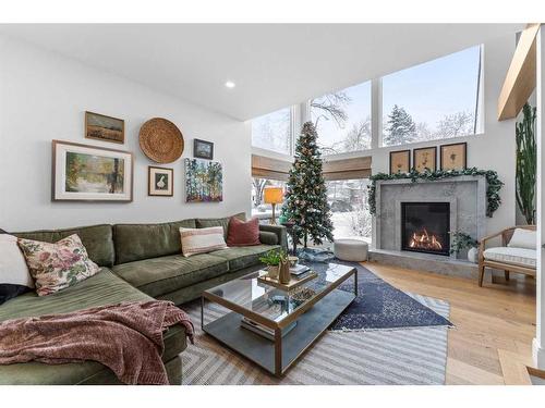 606 Alexander Crescent Nw, Calgary, AB - Indoor Photo Showing Living Room With Fireplace