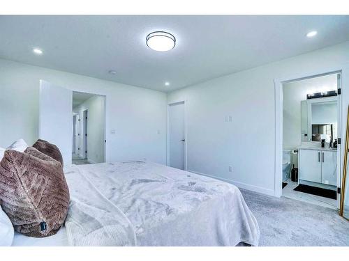 203 Saddlecrest Grove Ne, Calgary, AB - Indoor Photo Showing Bedroom