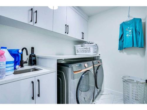 203 Saddlecrest Grove Ne, Calgary, AB - Indoor Photo Showing Laundry Room