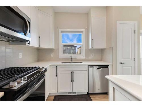 563 Cornerstone Avenue Ne, Calgary, AB - Indoor Photo Showing Kitchen With Double Sink