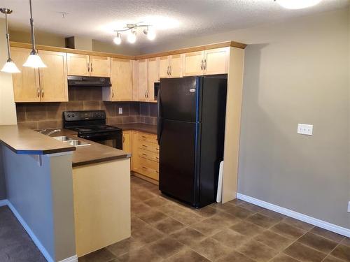 4206-31 Country Village Manor Ne, Calgary, AB - Indoor Photo Showing Kitchen