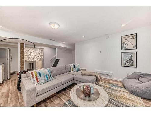 84 Everwillow Green Sw, Calgary, AB - Indoor Photo Showing Living Room With Fireplace