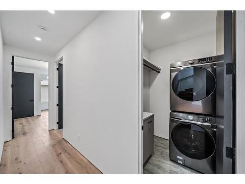 2301 13 Street Nw, Calgary, AB - Indoor Photo Showing Laundry Room