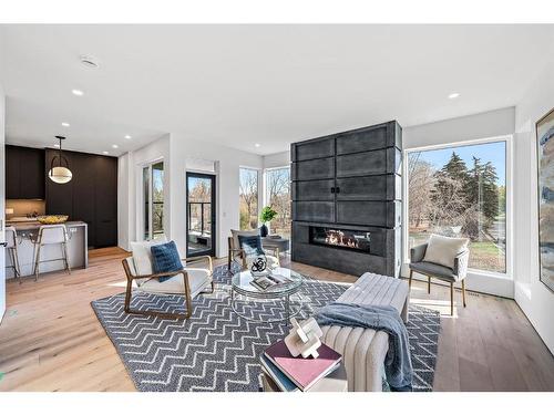 2301 13 Street Nw, Calgary, AB - Indoor Photo Showing Living Room With Fireplace