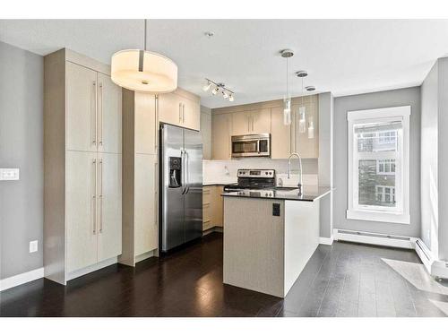 1211-11 Mahogany Row Se, Calgary, AB - Indoor Photo Showing Kitchen With Stainless Steel Kitchen With Upgraded Kitchen