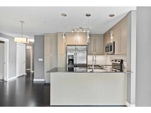 1211-11 Mahogany Row Se, Calgary, AB - Indoor Photo Showing Kitchen With Stainless Steel Kitchen With Upgraded Kitchen