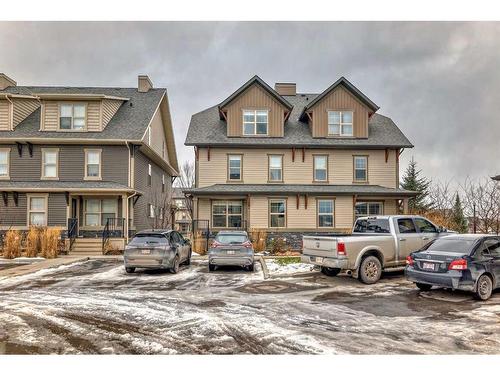 304-50 Belgian Lane, Cochrane, AB - Outdoor With Facade