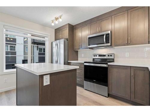 709-474 Seton Circle Se, Calgary, AB - Indoor Photo Showing Kitchen