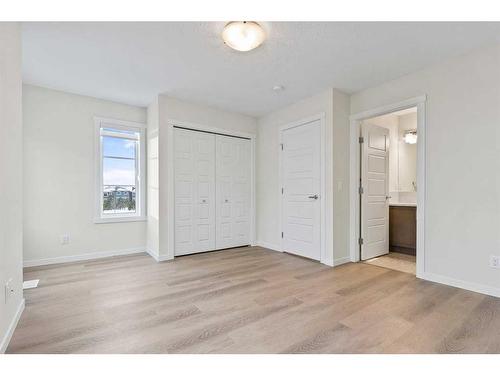 709-474 Seton Circle Se, Calgary, AB - Indoor Photo Showing Other Room