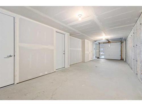 709-474 Seton Circle Se, Calgary, AB - Indoor Photo Showing Garage