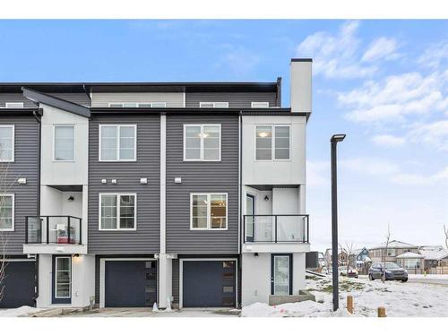 709-474 Seton Circle Se, Calgary, AB - Outdoor With Balcony With Facade