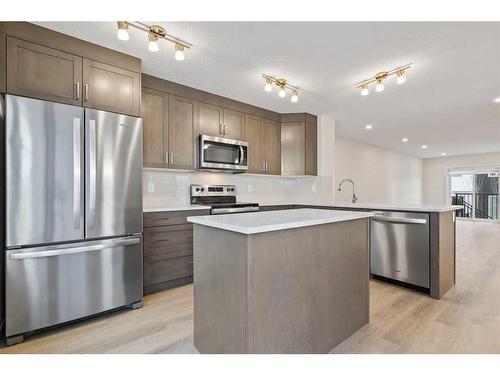 709-474 Seton Circle Se, Calgary, AB - Indoor Photo Showing Kitchen With Upgraded Kitchen