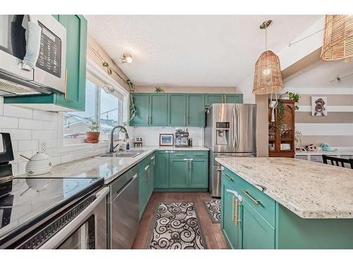 47 Auburn Bay Boulevard Se, Calgary, AB - Indoor Photo Showing Kitchen With Stainless Steel Kitchen With Upgraded Kitchen