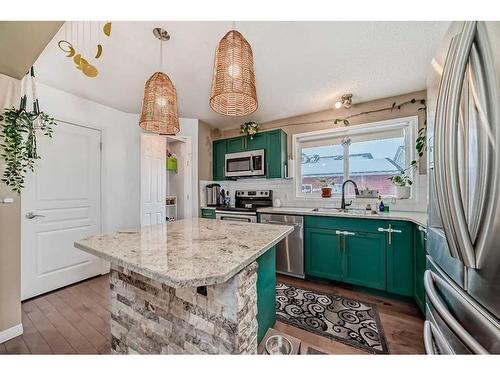 47 Auburn Bay Boulevard Se, Calgary, AB - Indoor Photo Showing Kitchen With Stainless Steel Kitchen With Double Sink With Upgraded Kitchen