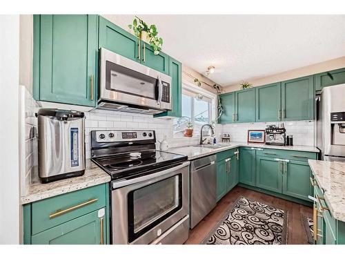 47 Auburn Bay Boulevard Se, Calgary, AB - Indoor Photo Showing Kitchen With Stainless Steel Kitchen With Upgraded Kitchen