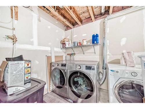 47 Auburn Bay Boulevard Se, Calgary, AB - Indoor Photo Showing Laundry Room