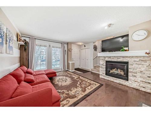 47 Auburn Bay Boulevard Se, Calgary, AB - Indoor Photo Showing Living Room With Fireplace