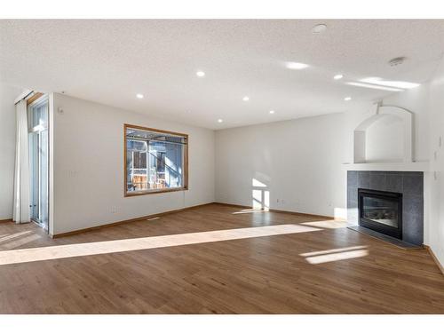 13 Edgeridge Mews Nw, Calgary, AB - Indoor With Fireplace