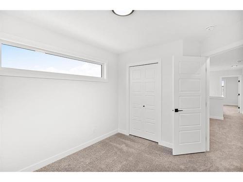 139 Lewiston Drive Ne, Calgary, AB - Indoor Photo Showing Other Room