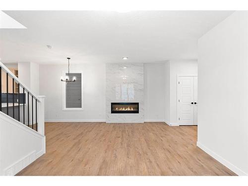 139 Lewiston Drive Ne, Calgary, AB - Indoor With Fireplace