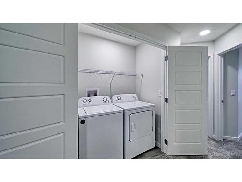 605 Dawson Drive, Chestermere, AB - Indoor Photo Showing Laundry Room