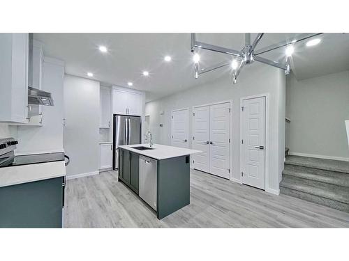 605 Dawson Drive, Chestermere, AB - Indoor Photo Showing Kitchen With Stainless Steel Kitchen