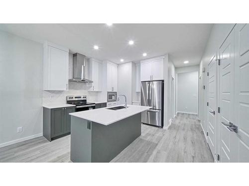 605 Dawson Drive, Chestermere, AB - Indoor Photo Showing Kitchen With Stainless Steel Kitchen With Upgraded Kitchen