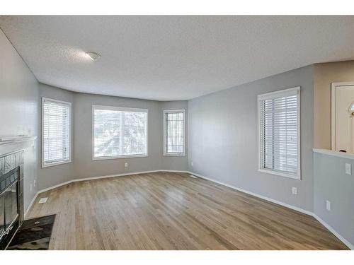 425 15 Street Nw, Calgary, AB - Indoor Photo Showing Other Room With Fireplace