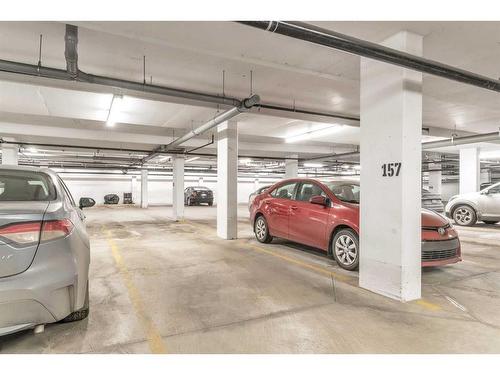 33-25 Auburn Meadows View Se, Calgary, AB - Indoor Photo Showing Garage