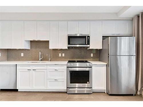 33-25 Auburn Meadows View Se, Calgary, AB - Indoor Photo Showing Kitchen With Stainless Steel Kitchen