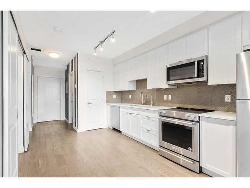 33-25 Auburn Meadows View Se, Calgary, AB - Indoor Photo Showing Kitchen