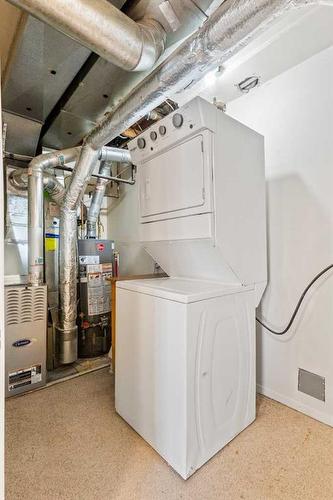 53-3015 51 Street Sw, Calgary, AB - Indoor Photo Showing Laundry Room