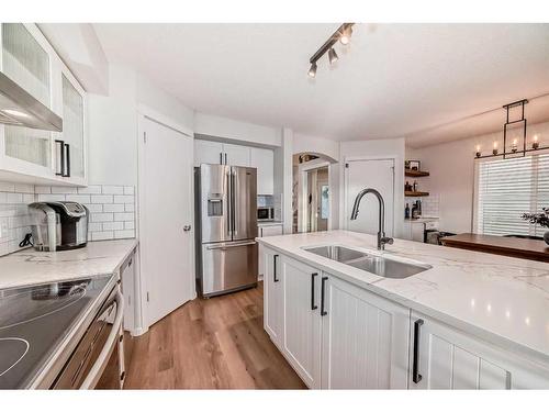 37 Tuscany Springs Park Nw, Calgary, AB - Indoor Photo Showing Kitchen With Double Sink With Upgraded Kitchen