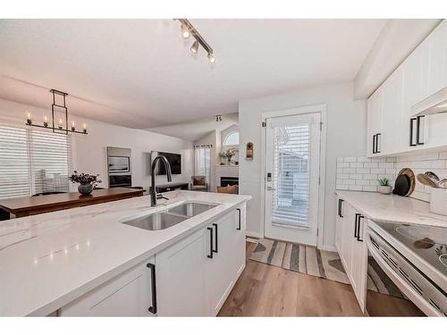 37 Tuscany Springs Park Nw, Calgary, AB - Indoor Photo Showing Kitchen With Double Sink