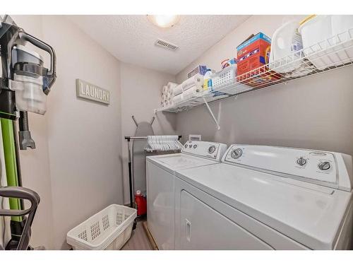 37 Tuscany Springs Park Nw, Calgary, AB - Indoor Photo Showing Laundry Room