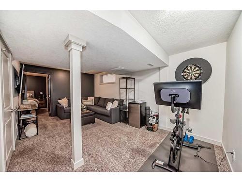 37 Tuscany Springs Park Nw, Calgary, AB - Indoor Photo Showing Gym Room