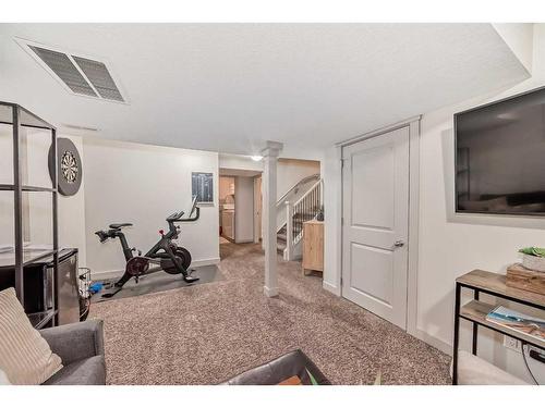 37 Tuscany Springs Park Nw, Calgary, AB - Indoor Photo Showing Gym Room