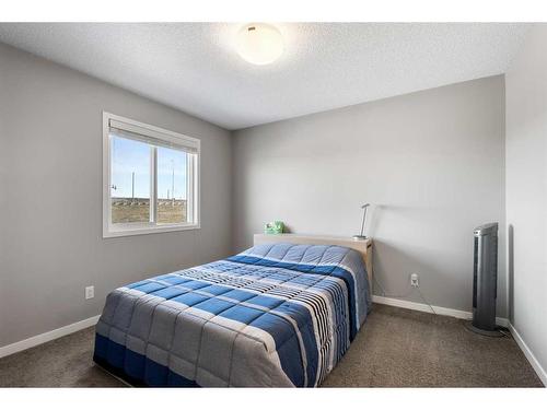 510 Panatella Walk Nw, Calgary, AB - Indoor Photo Showing Bedroom